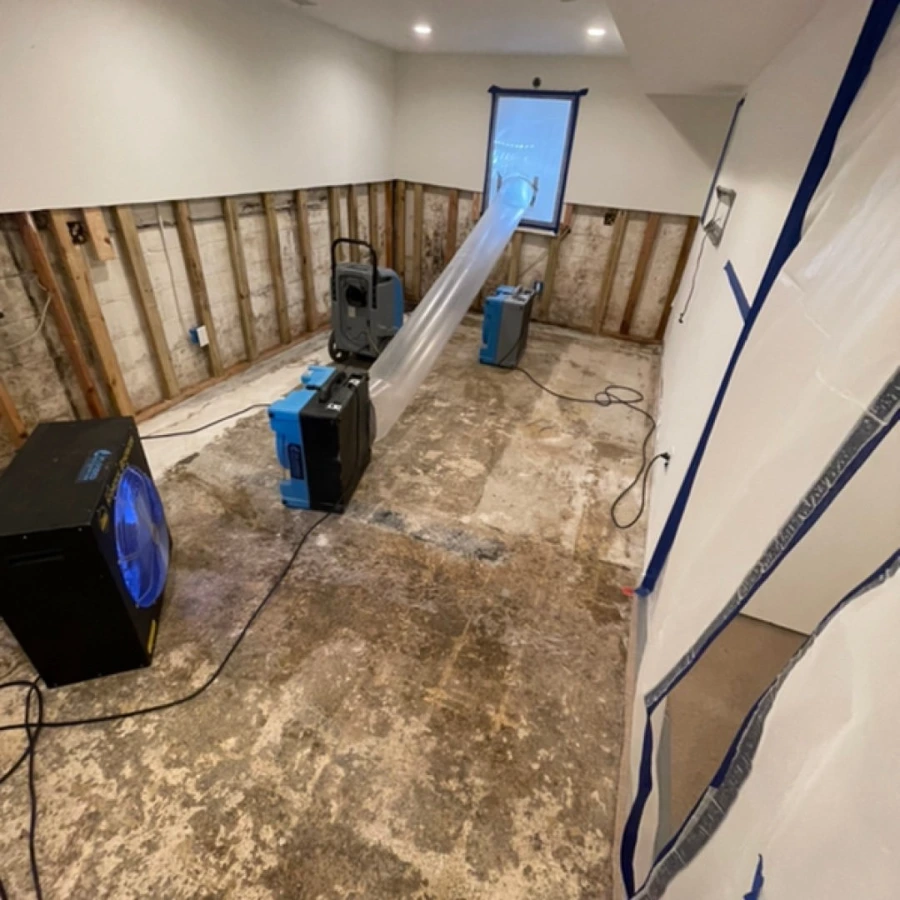 Plastic containment barrier and negative air ducting set up during Minneapolis mold remediation